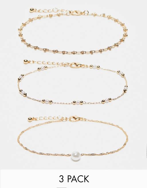 ASOS DESIGN – 3er-Pack goldfarbene Fußkettchen mit Kunstperlen- und Kügelchen-Design