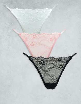 ASOS DESIGN - 3er-Pack String-Tangas aus Spitze in Schwarz, Weiß und Staubrosa-Bunt