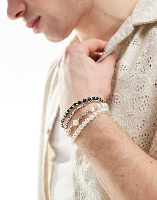 ASOS DESIGN 4 pack bracelet set with faux pearl and bead mix