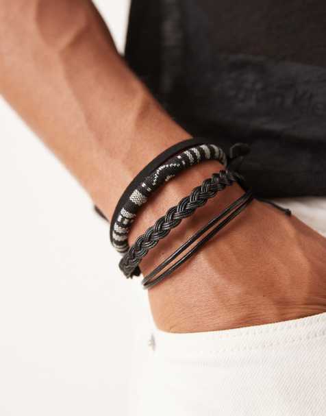 ASOS DESIGN 4 pack faux leather and woven bracelet in monochrome - view 1