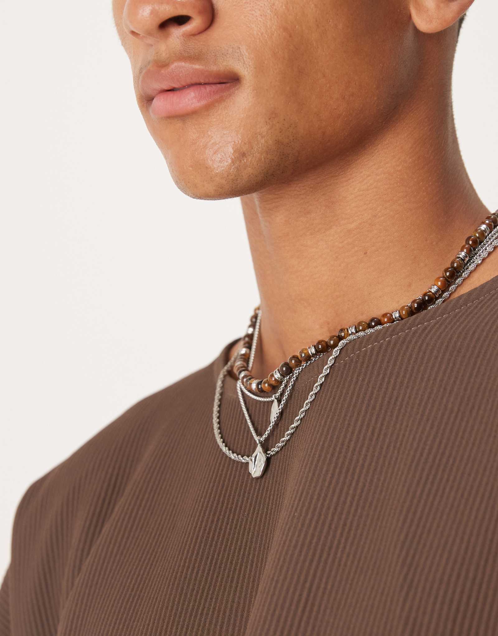 ASOS DESIGN 4-х комплектные фестивальные ожерелья из расплавленного серебра со смешанными бусинами и цепочками