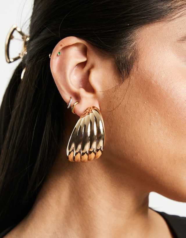 ASOS DESIGN 45 mm hoop earrings with textured twist design in gold tone