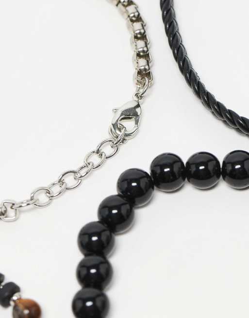 ASOS DESIGN – 4er-Pack Festival-Armbänder mit Perlen- und Kettendesign in Schwarz  , 3 von 3