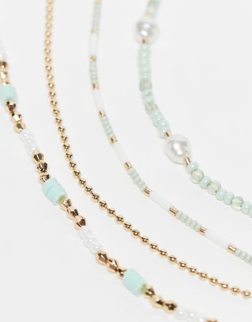 ASOS DESIGN – 4er-Pack Fußkettchen mit grünem und goldenem Perlendesign, 2 von 4