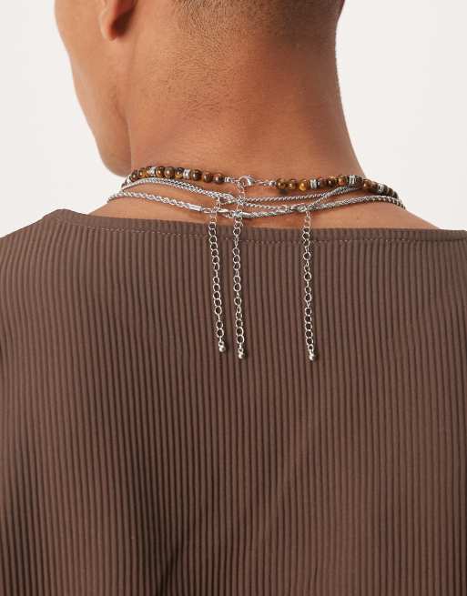 ASOS DESIGN – 4er-Pack gemischte, silberfarbene Festival-Halsketten mit Ketten- und Perlendesign und Anhänger in geschmolzener Optik