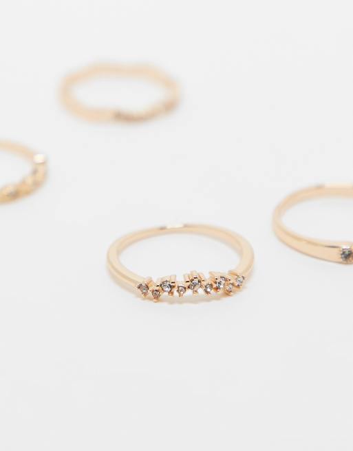 ASOS DESIGN – 4er-Set goldfarbene Ringe mit zarten Kristalldetails, 2 von 3