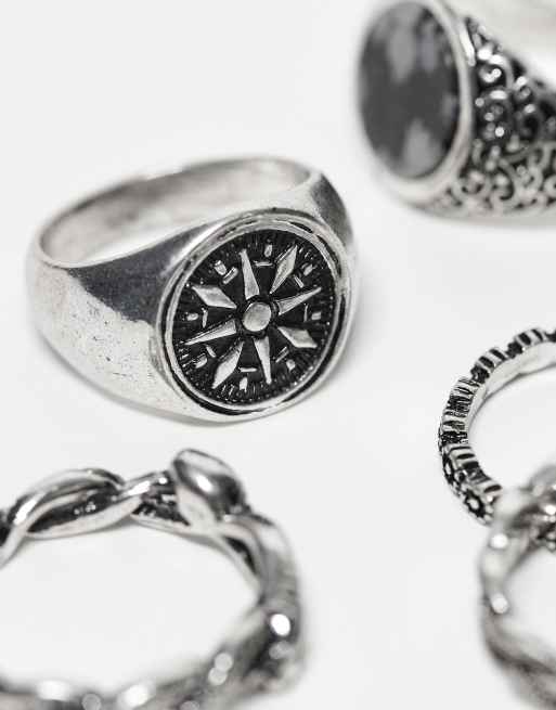 ASOS DESIGN 5 pack signet rings with black stone and compass in burnished silver tone
