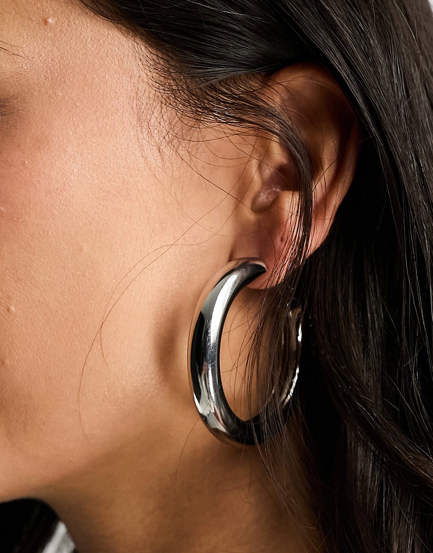 ASOS DESIGN 50mm hoop earrings in thick tube in silver tone