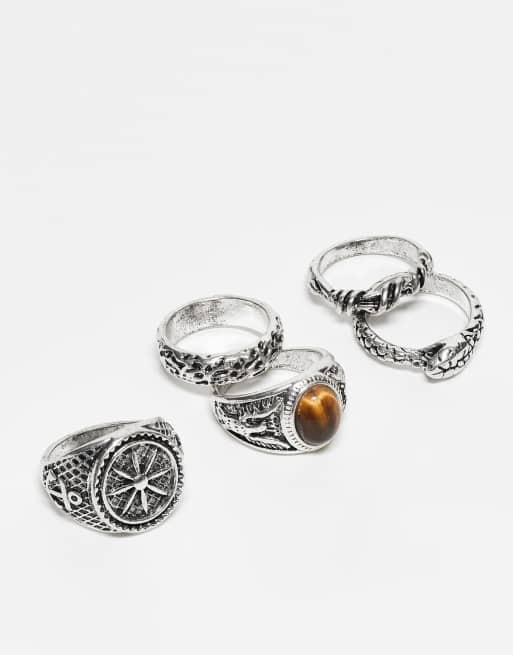 ASOS DESIGN – 5er-Pack Ringe in polierter Silberoptik mit Kompass-Motiv und Stein in Tigerauge-Optik