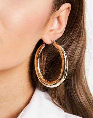ASOS DESIGN 60mm hoop earrings with oval design in gold tone - ASOS Price Checker