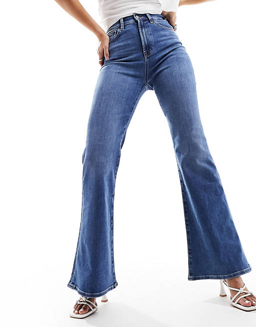 ASOS DESIGN '70s power stretch flared jeans in mid blue