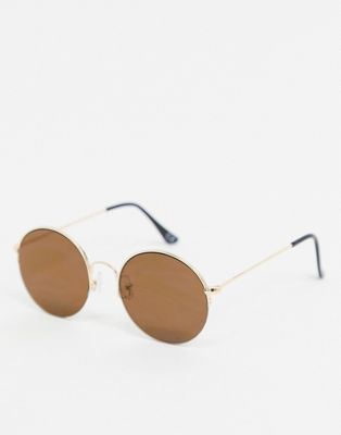 ASOS DESIGN 70s round sunglasses in gold metal half rim with brown lens