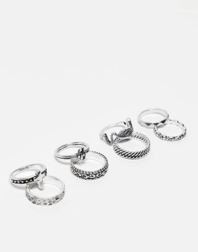 ASOS DESIGN 8 pack band rings with skull and cross in burnished silver tone