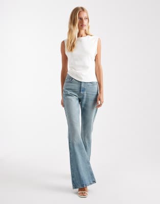 ASOS DESIGN - 90er-Jahre Schlaghose in blasser Vintage-Waschung-Blau