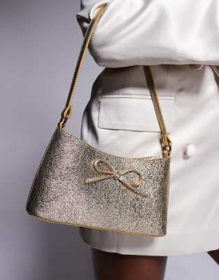 ASOS DESIGN - 90er-Jahre Schultertasche in Gold mit Schleife-Goldfarben