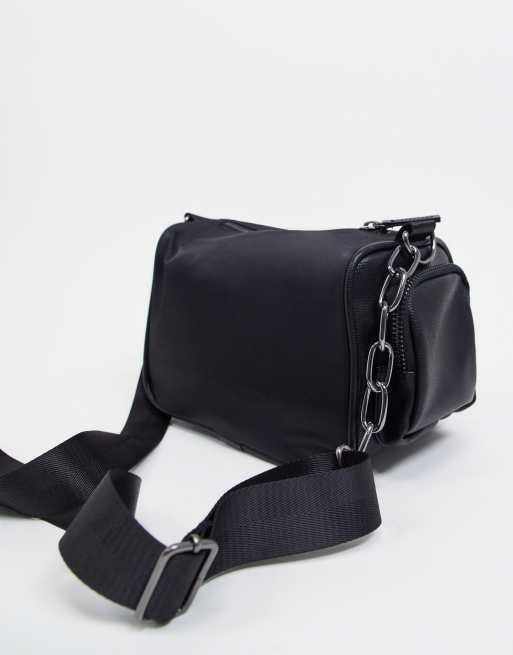 ASOS DESIGN mini barrel bag with cross body strap in black faux leather