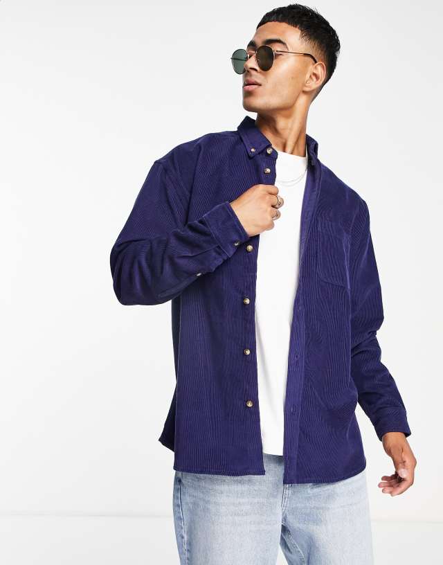 ASOS DESIGN 90s oversized cord shirt in navy