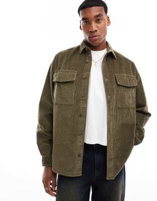 ASOS DESIGN 90s oversized cord shirt with patch pocket in khaki-Green