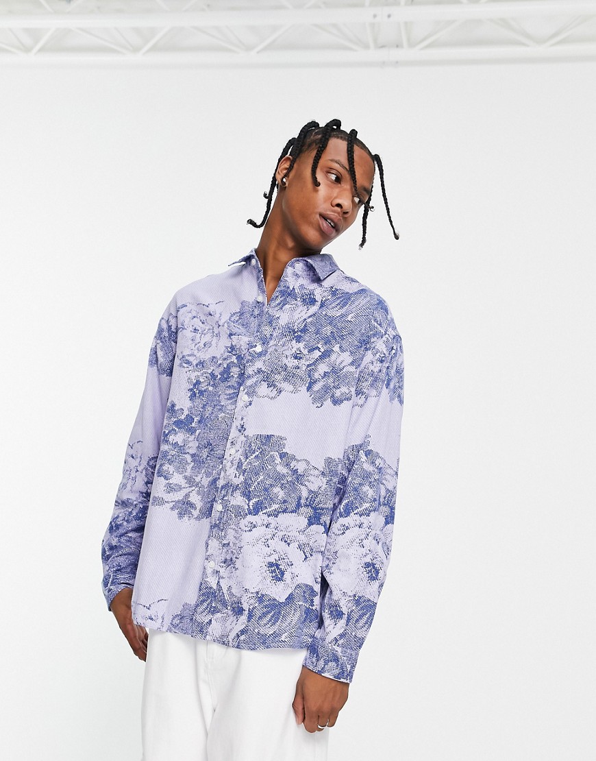 ASOS DESIGN 90s oversized denim shirt in floral print-Blue