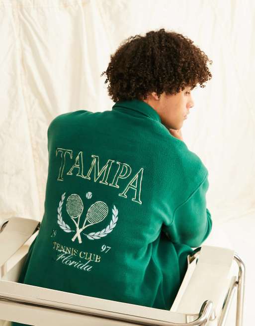 ASOS DESIGN 90s oversized polar fleece overshirt in green with back embroidery