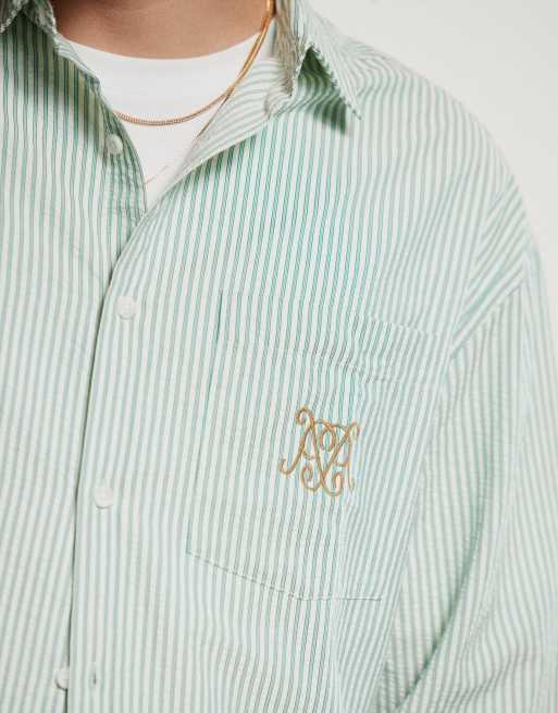 ASOS DESIGN 90s oversized shirt in green stripe with chest embroidery, 2 of 4