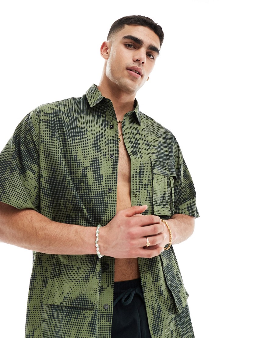 ASOS DESIGN 90s oversized shirt in pixel camo print with utility pockets-Green