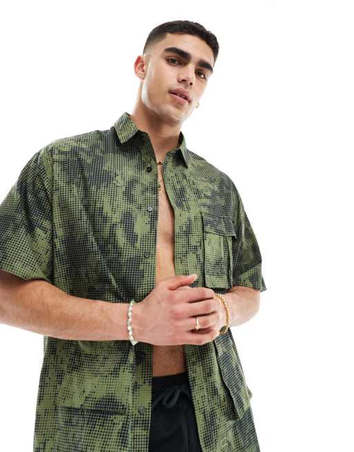 ASOS DESIGN 90s oversized shirt in pixel camo print with utility pockets