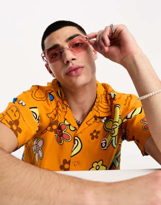 ASOS DESIGN 90s retro rimless sunglasses in with pink lens in silver