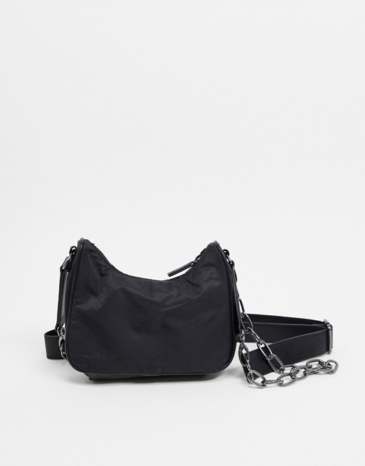 ASOS DESIGN 90's shoulder bag in black faux leather and chains