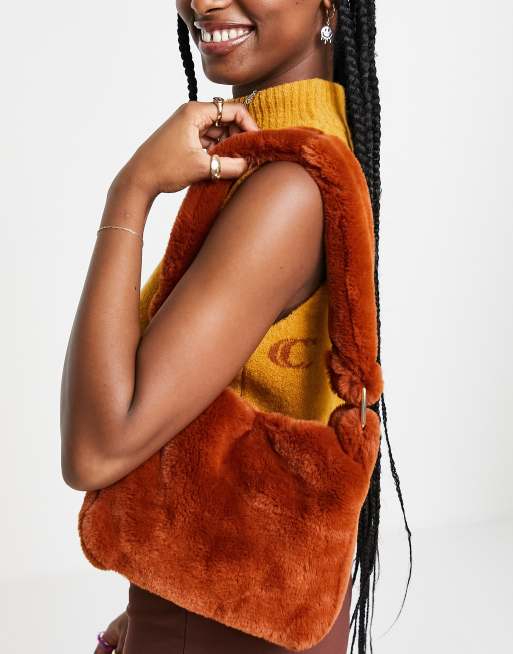 ASOS DESIGN 90s shoulder bag in brown faux fur