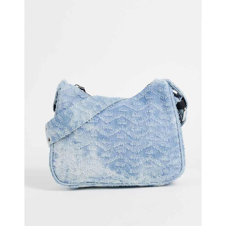 ASOS DESIGN 90s monogram denim shoulder bag in blue