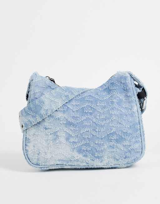 ASOS DESIGN 90s monogram denim shoulder bag in blue