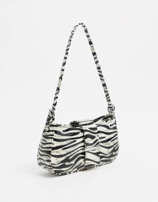 ASOS DESIGN 90s shoulder bag in glow in the dark zebra print