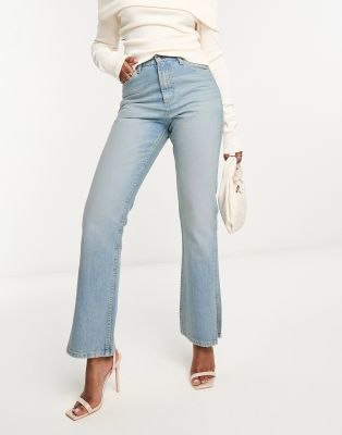 ASOS DESIGN 90s straight jean with single knee rip in blue