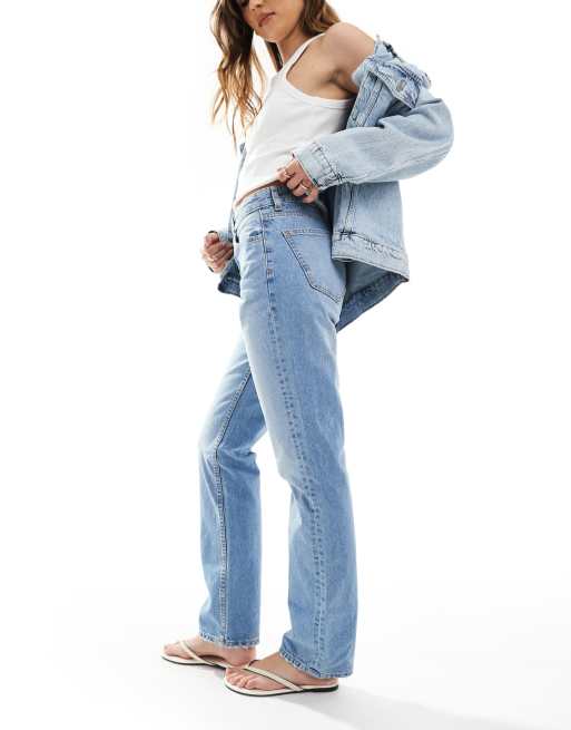 ASOS DESIGN mid rise straight leg jeans in light mid wash