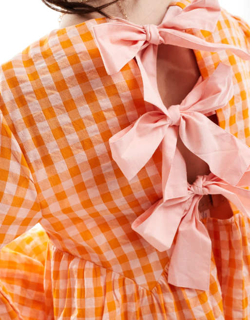 ASOS DESIGN - Aangerimpelde mini jurk met textuur en gingham ruit in oranje en roze, 4 van 4