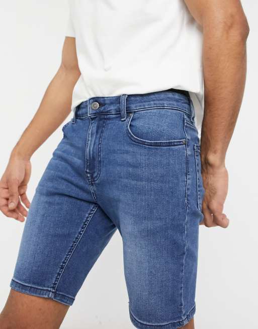 ASOS DESIGN - Aansluitende denim short met powerstretch in blauw met donkere wassing
