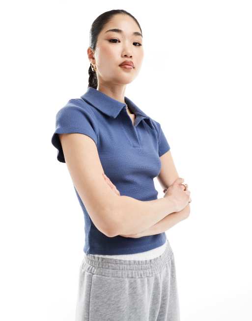 ASOS DESIGN - Aansluitende polotop met korte mouwen en wafelstructuur in blauw