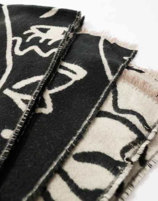 ASOS DESIGN abstract face jacquard woven scarf in stone and black, 3 of 4