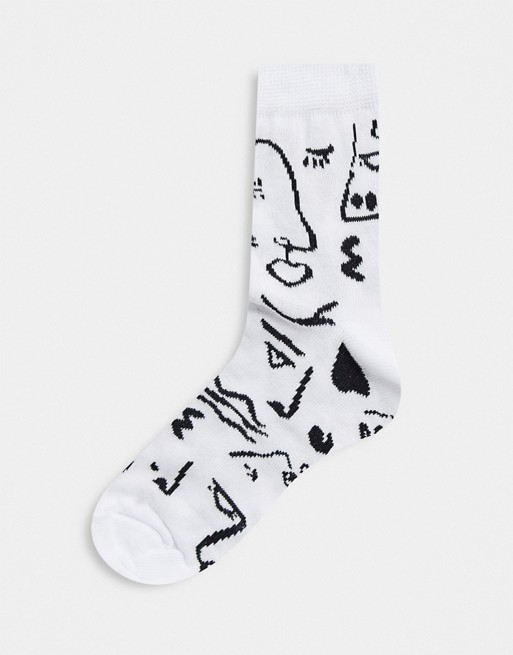 ASOS DESIGN abstract face print ankle socks in white