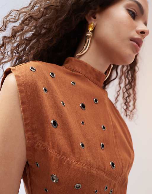 ASOS DESIGN acid wash twill eyelet detail mini dress in tan ASOS DESIGN acid wash twill eyelet detail mini dress in tan