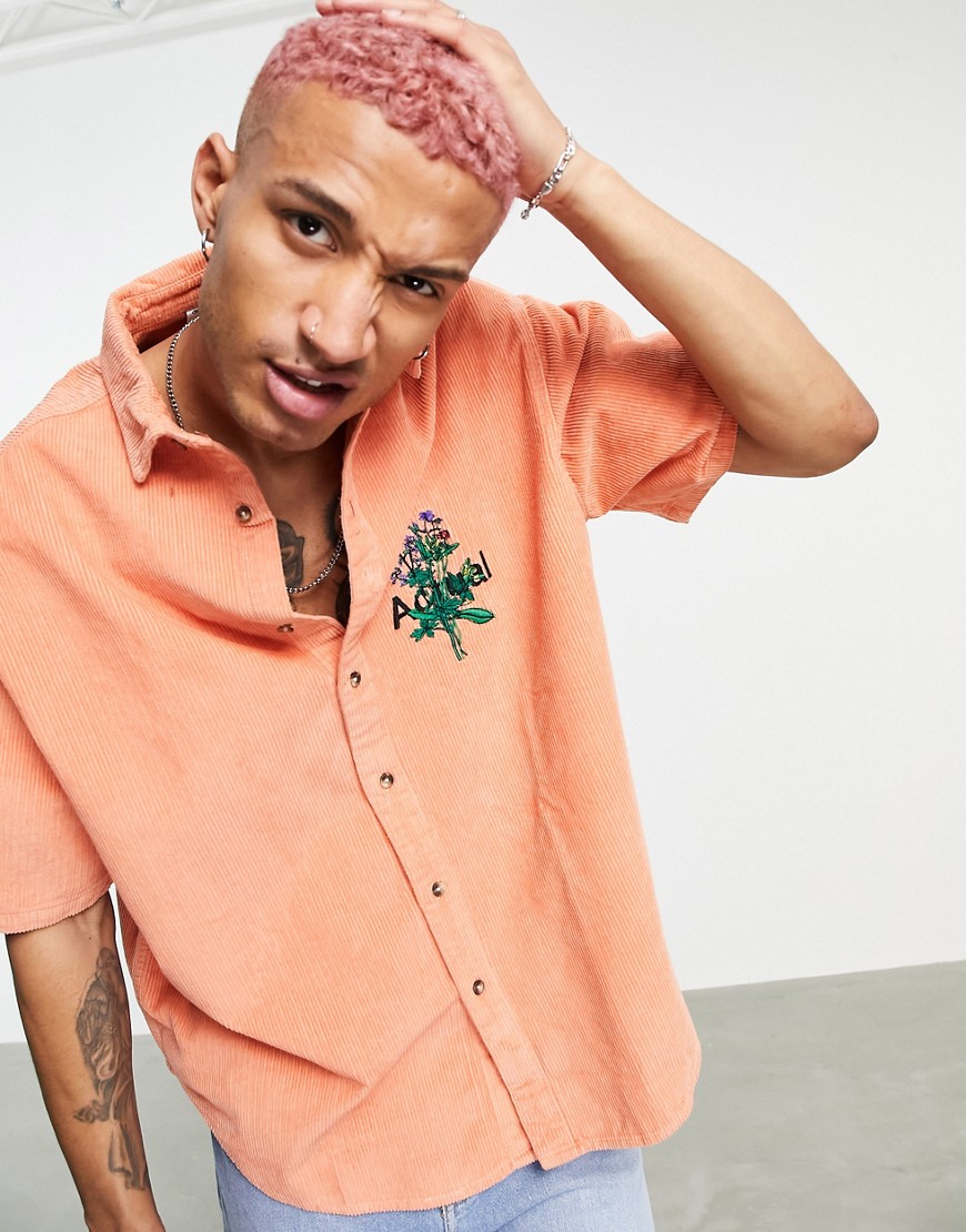ASOS DESIGN Actual 90s boxy oversized chunky cord shirt with floral embroidery-Orange