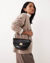 ASOS DESIGN loop through clutch bag in black and cream stripes