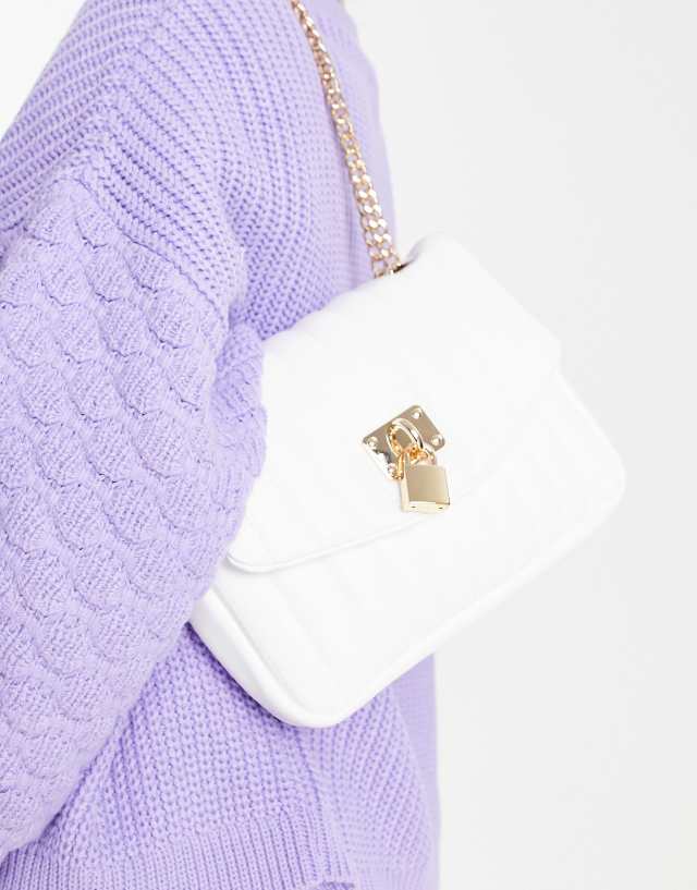 ASOS DESIGN adjustable quilted shoulder bag with padlock in white