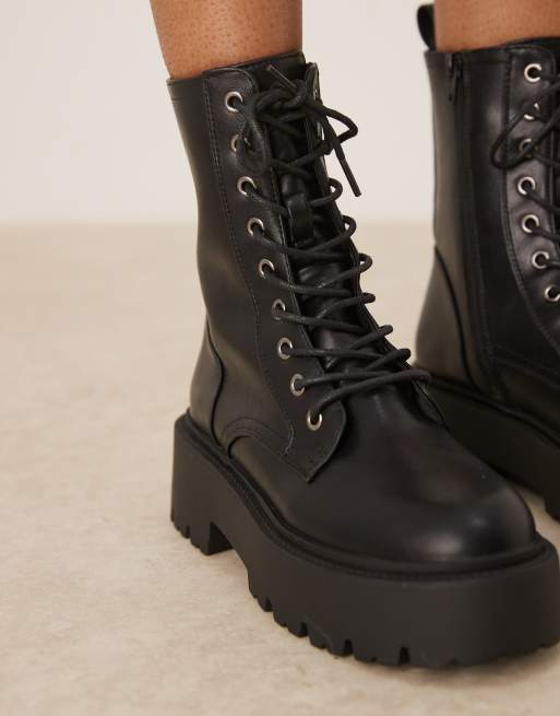 ASOS DESIGN Adventure chunky lace up boots in black