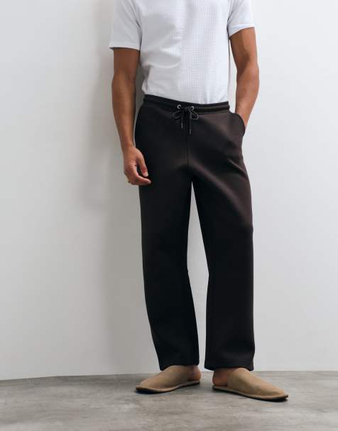 ASOS DESIGN afslappede tapered joggingbukser med detaljer i sølvfarvet hardware i scuba-lignende stof i torte - view 1