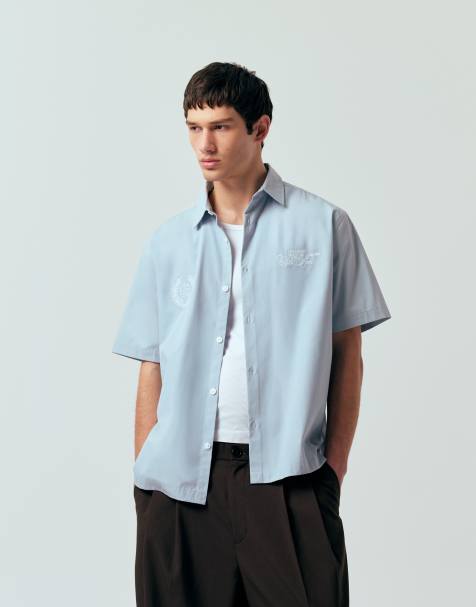 ASOS DESIGN - Afslappet lyseblå skjorte med brystbrodering - view 1