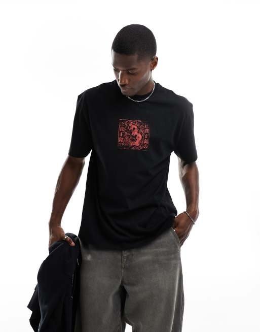 ASOS DESIGN - Afslappet T-shirt med souvenirprint på brystet i sort