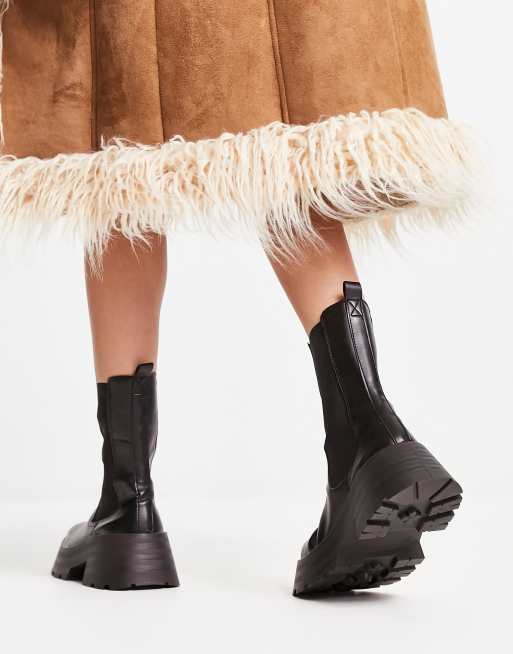 Sock style heeled ankle boots with lug on sale soles