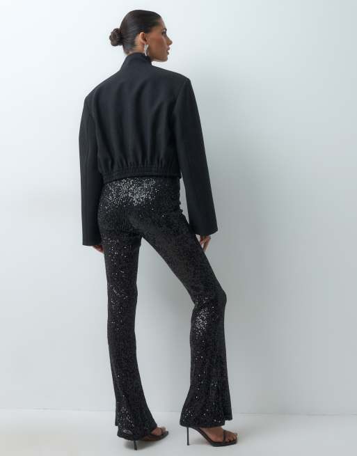 ASOS DESIGN allover sequin flare trousers in black, 4 of 5